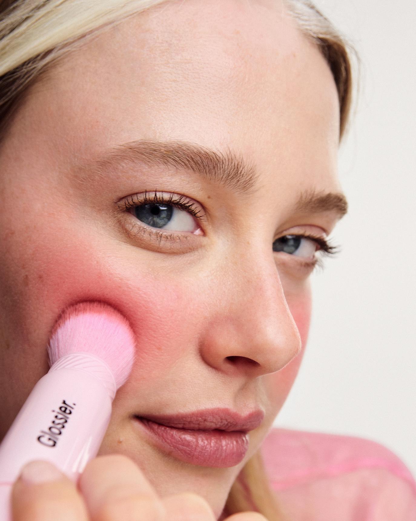 Tia wears Cloud Paint Plush Blush in Float.